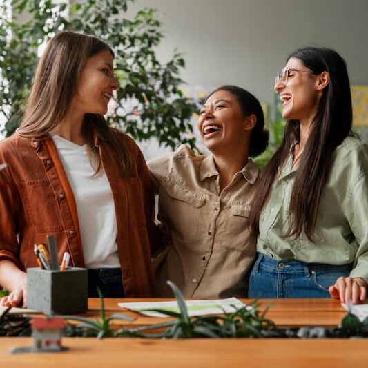 people happily working together
